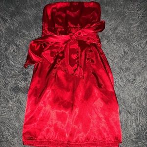 Red strapless satin dress with bow